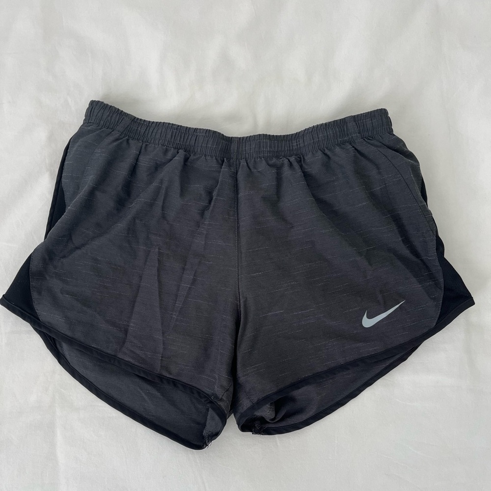 Grey and black Nike shorts